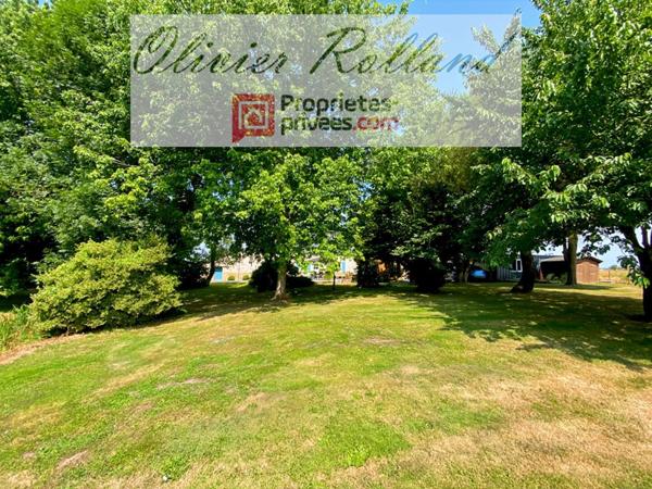 Magnifique longère rénovée avec goût au coeur d'un superbe parc