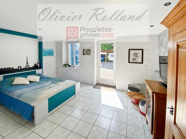 Magnifique longère rénovée avec goût au coeur d'un superbe parc