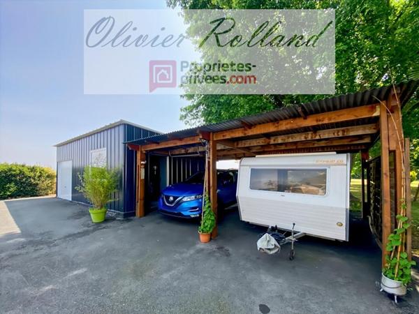 Magnifique longère rénovée avec goût au coeur d'un superbe parc