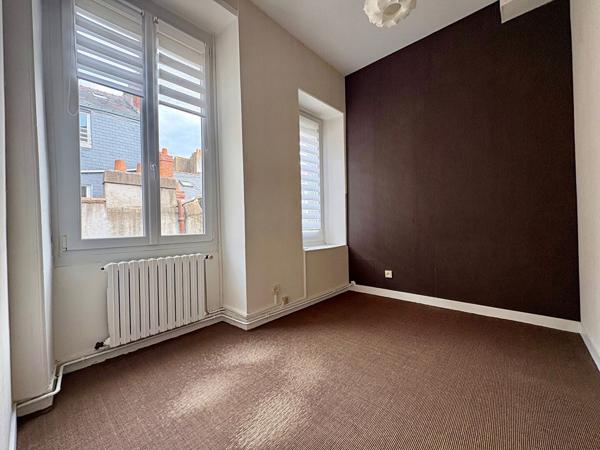 Du charme pour ce duplex en coeur de ville
