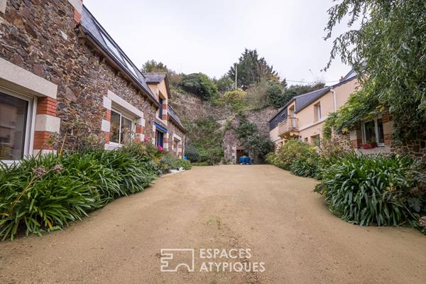 Maison en pierre avec un gîte