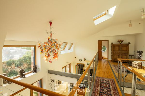 Maison en pierre avec un gîte