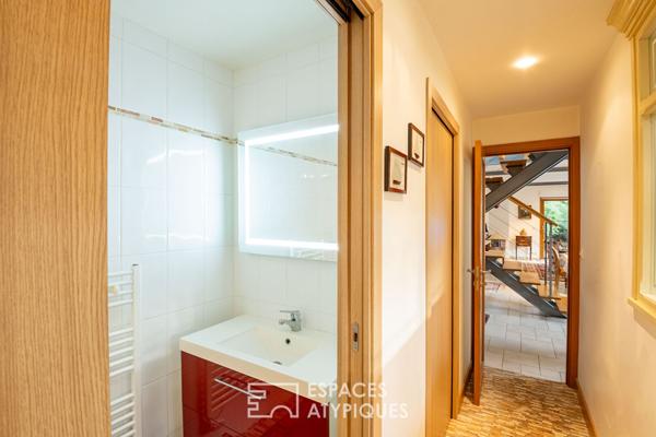 Maison en pierre avec un gîte