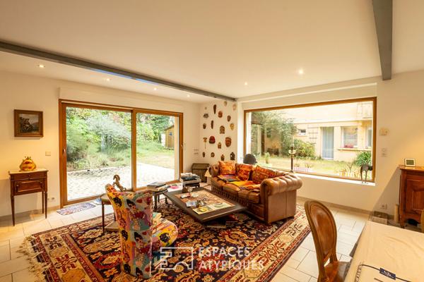 Maison en pierre avec un gîte