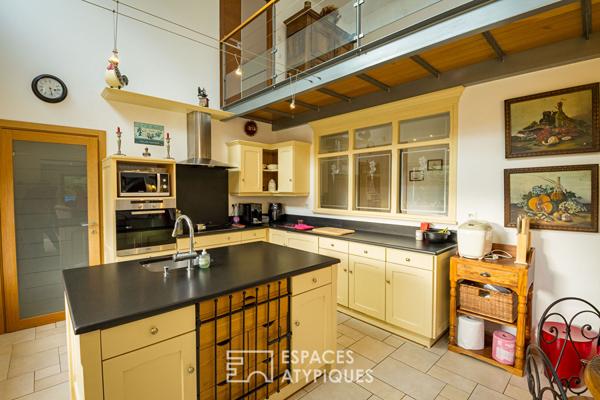 Maison en pierre avec un gîte