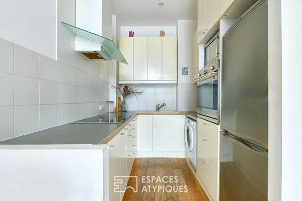 Ancien atelier transformé en loft sur cour – Marché Cadet