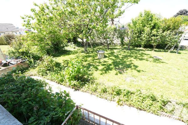 Maison L'Huisserie cinq chambres, un bureau, sous sol complet et jardin