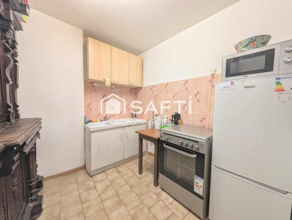 APPARTEMENT 60 M² AVEC TERRASSE ET PARKING COUVERT