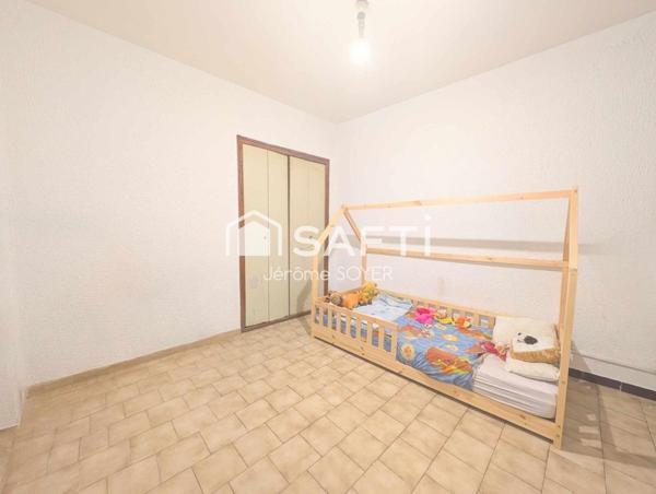 APPARTEMENT 60 M² AVEC TERRASSE ET PARKING COUVERT