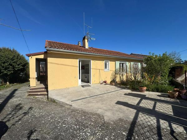 Maison avec jardin , garage et un atelier, des commodités juste à pied !