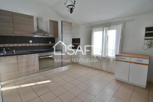 Immeuble de rapport et hangar avec terrain.