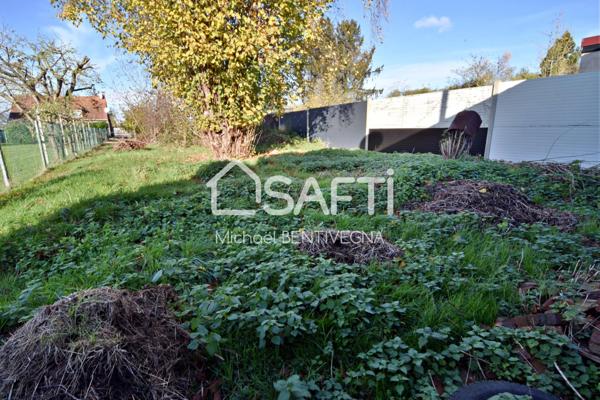 Immeuble de rapport et hangar avec terrain.