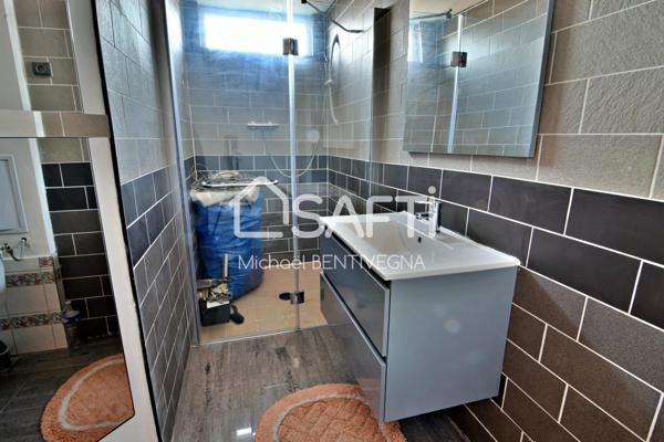 Immeuble de rapport et hangar avec terrain.