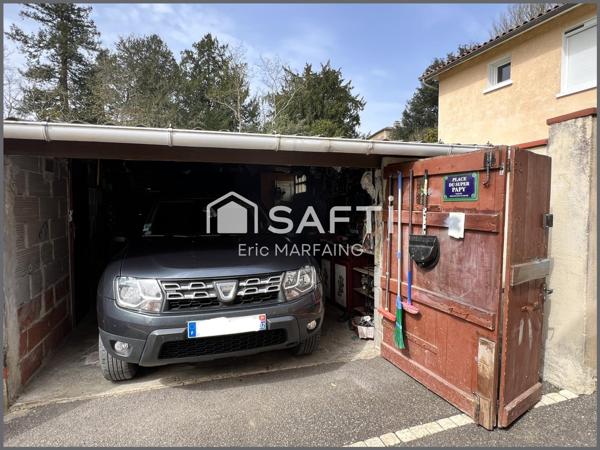 Maison de village sans travaux avec garages et jardin