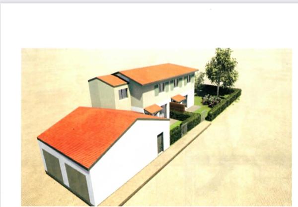 Garage avec deux box et son terrain constructible