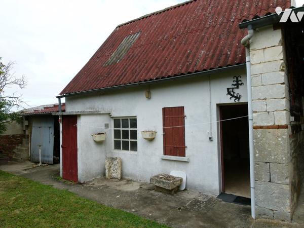 véranda, séjour, cuisine, 3 chambres, salle d'eau, WC, chauffage électrique, buanderie, atelier,