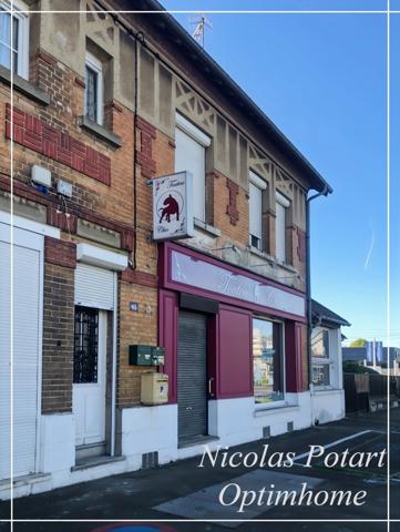 Immeuble de rapport à fort potentiel avec commerce