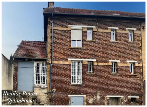 Immeuble de rapport à fort potentiel avec commerce