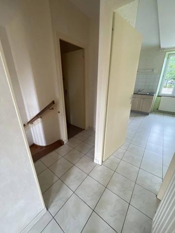 Maison en pierre avec jardin et garage