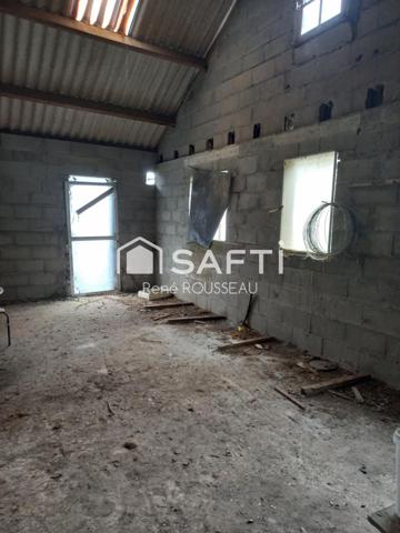 Bâtiment sur terrain constructible