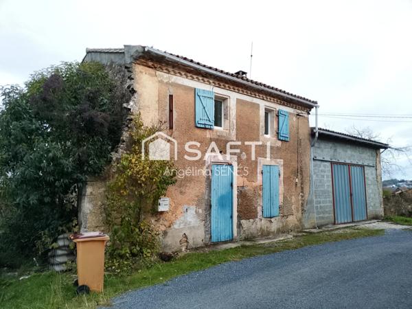 Maison avec grande garage et dépendances