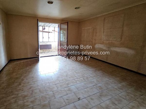 Maison à rénover,  avec 2 garages sur grand parcelle