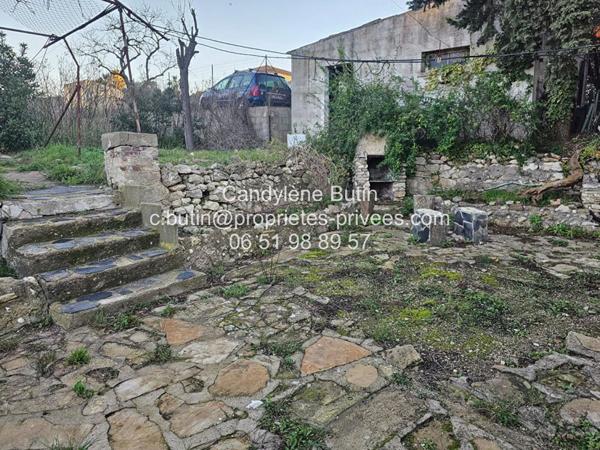 Maison à rénover,  avec 2 garages sur grand parcelle