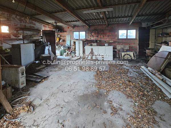 Maison à rénover,  avec 2 garages sur grand parcelle