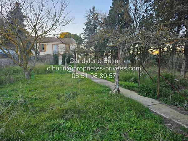 Maison à rénover,  avec 2 garages sur grand parcelle