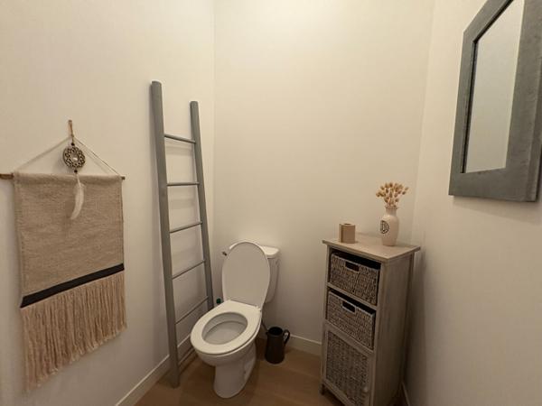 Appartement T3 avec terrasse, cave et double stationnement