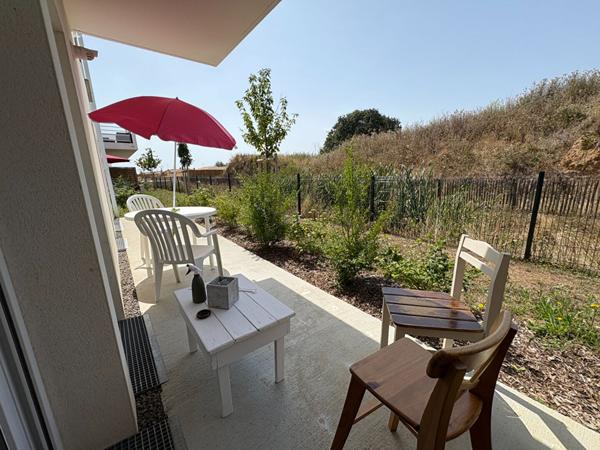 Appartement T3 avec terrasse, cave et double stationnement