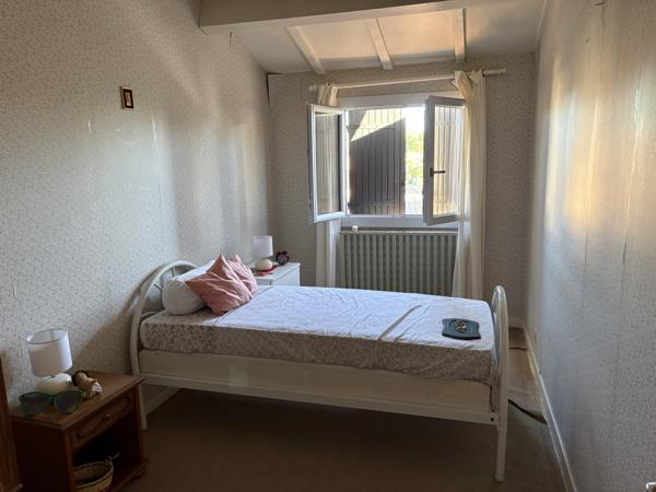 Maison avec 3 chambres, jardin, garage, proche des commodités