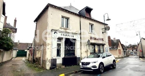 Immeuble mixte commerce / habitation - Centre-ville et 2 garages