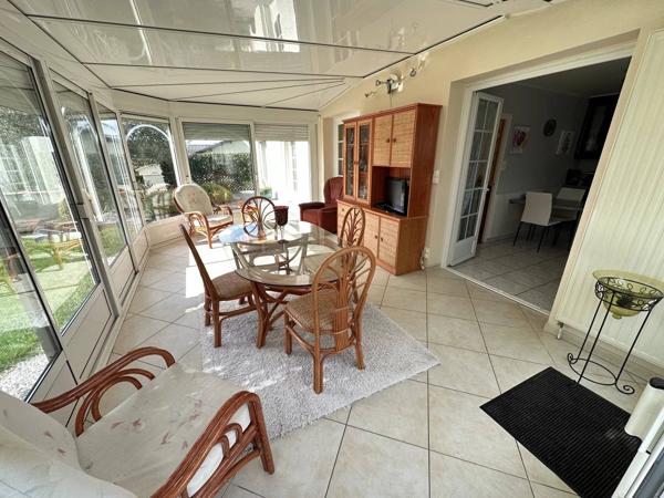 Maison sur sous-sol de 120 m² avec véranda sur terrain de 704 m² proche hypermarché