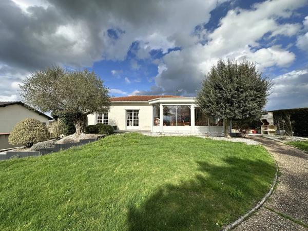 Maison sur sous-sol de 120 m² avec véranda sur terrain de 704 m² proche hypermarché