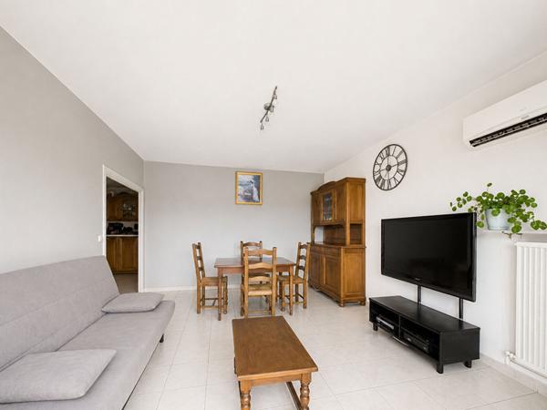 Appartement T4 - 94 m2 avec balcon et garage à Romans Sur Isère