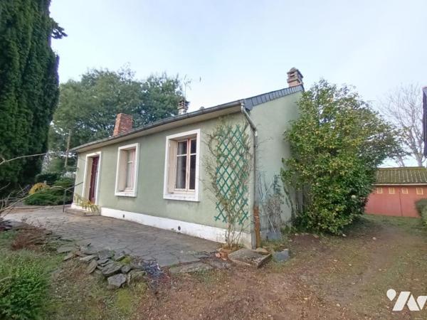 Ensemble immobilier avec maison 3 chambres et local commercial loué !