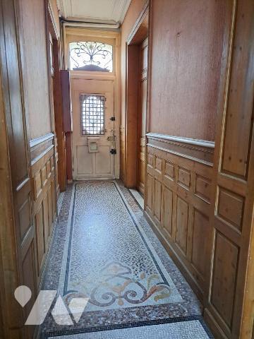 Douai, maison de ville double distribution avec jardin et 2 garages attenants