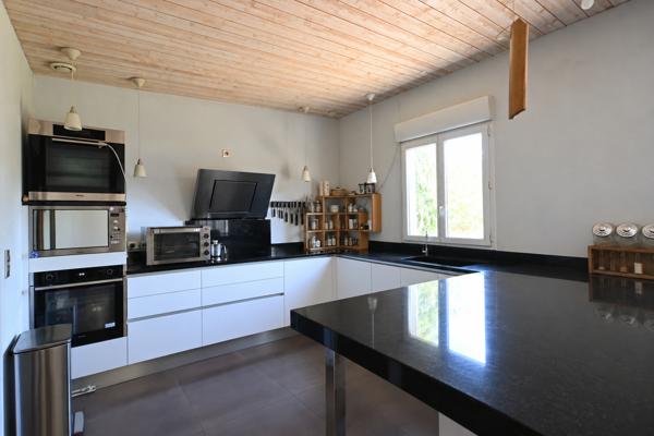 Maison nature en bois de 110 m² et son grand terrain