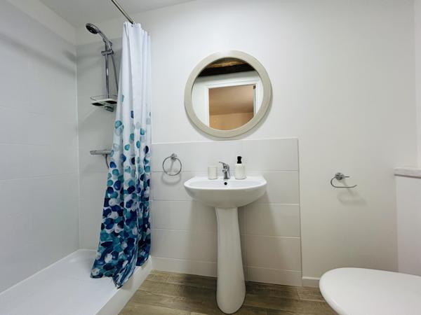 Immaculately Renovated 4-Bedroom, 3-Bathroom Village Home with Courtyard, Garage and Barn