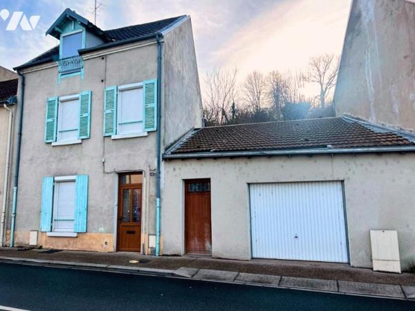 Maison de ville avec garage & jardin