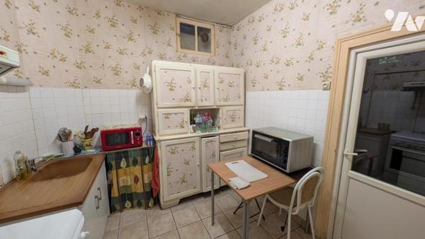 Maison de ville avec garage & jardin