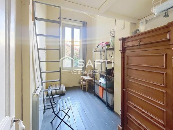 Bail  a céder -Local plus appartement -jardin de 200m2.
