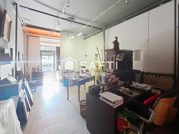 Bail  a céder -Local plus appartement -jardin de 200m2.