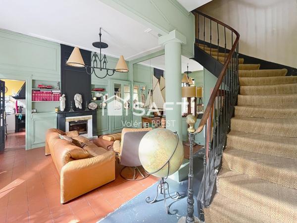 Bail  a céder -Local plus appartement -jardin de 200m2.