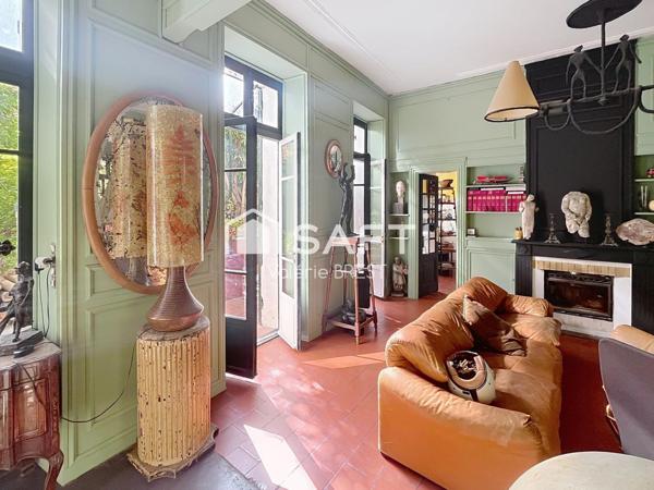 Bail  a céder -Local plus appartement -jardin de 200m2.