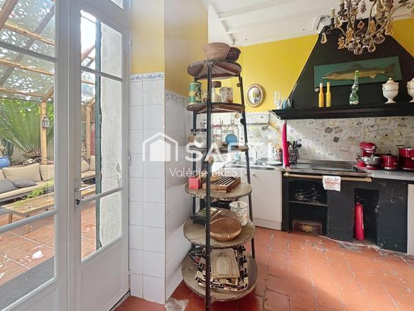 Bail  a céder -Local plus appartement -jardin de 200m2.