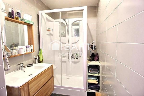 Bail  a céder -Local plus appartement -jardin de 200m2.