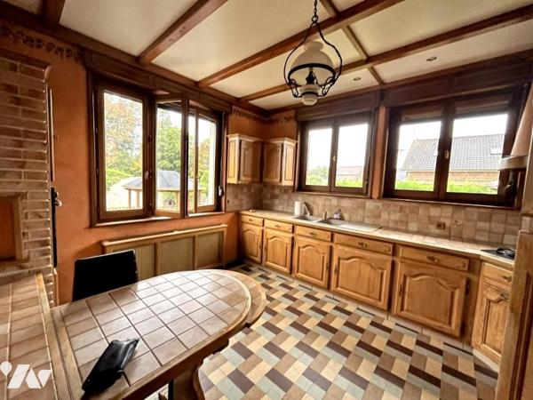 Maison individuelle en semi plain-pied  en retrait de rue