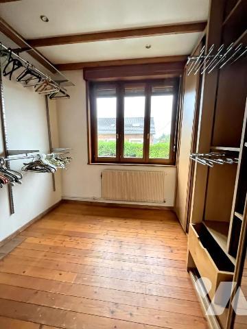 Maison individuelle en semi plain-pied  en retrait de rue